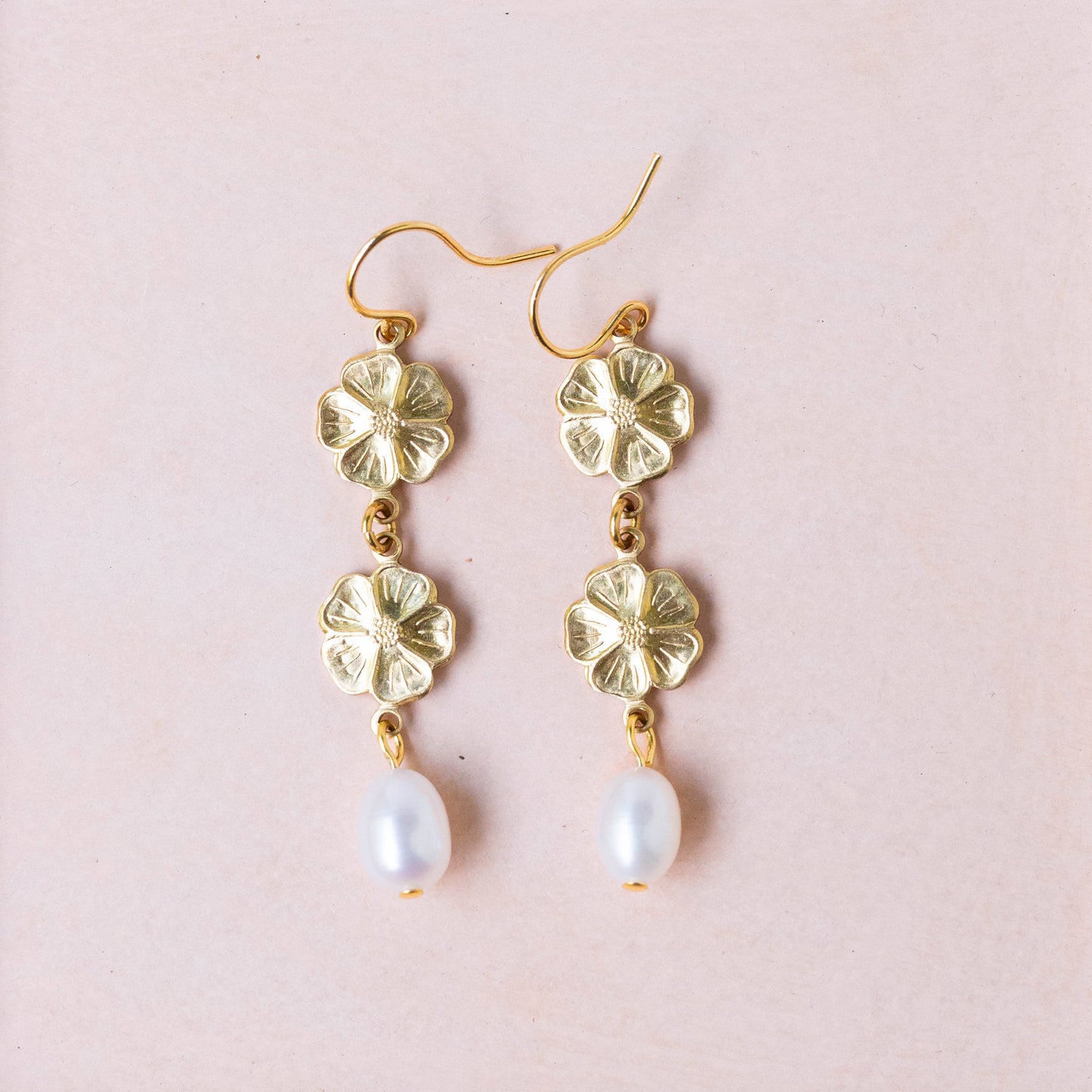 Pearl and two flower dangle earrings