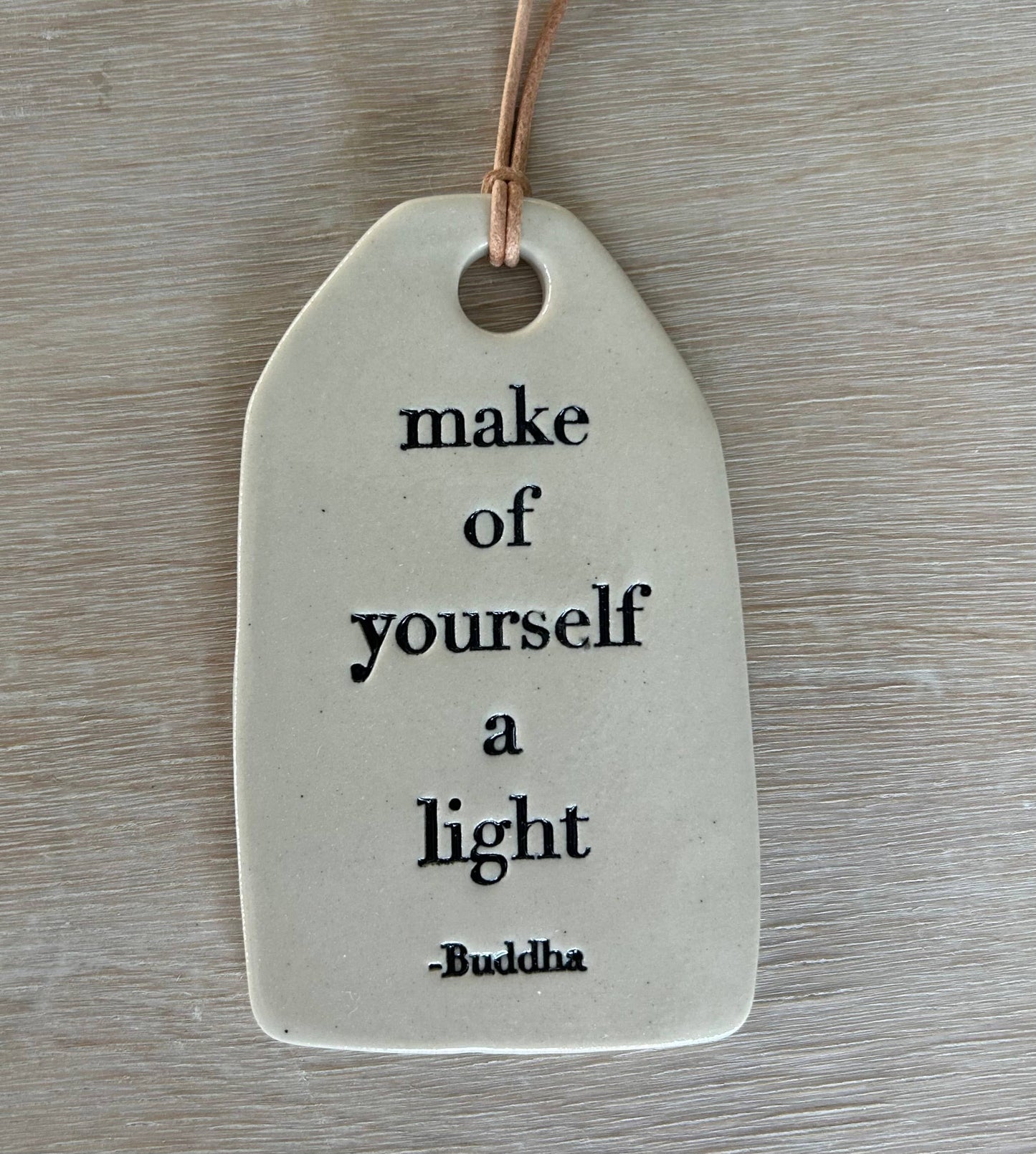 Ceramic Quote Tag: make of yourself a light... Buddha